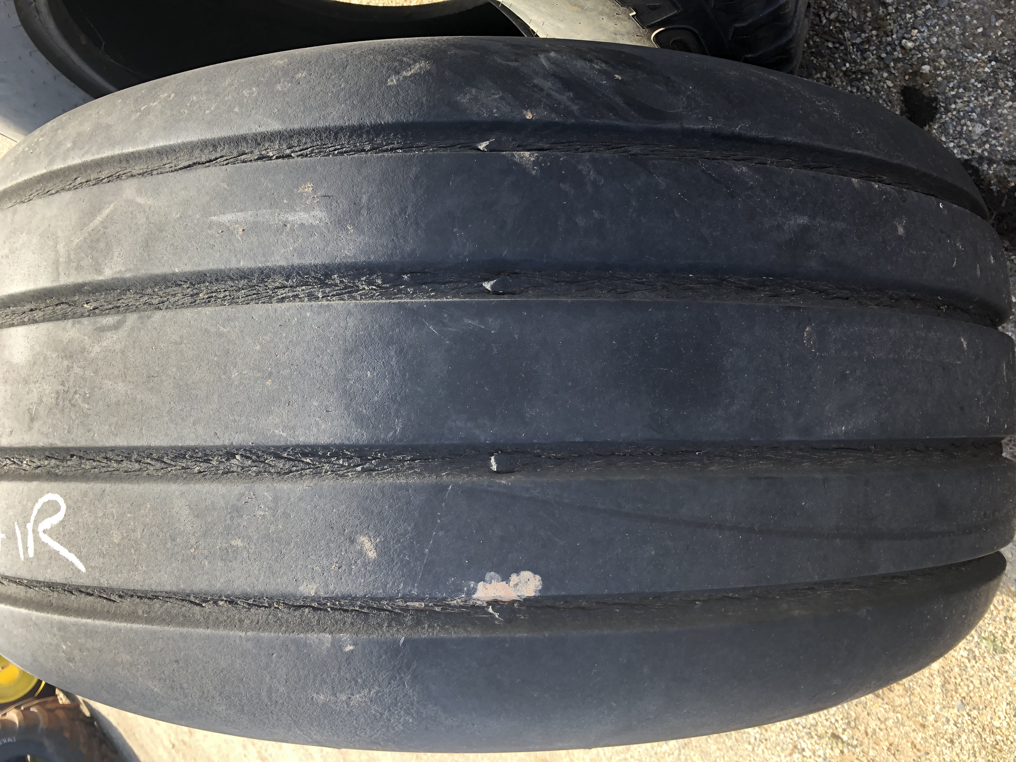 21.5L16.1 Goodyear, stubble damaged but holds air