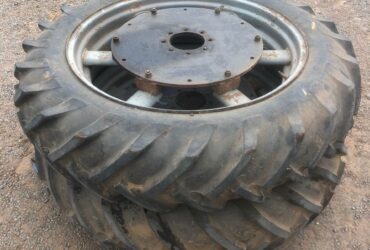 Pair of tractor tyres and rims with Massey Ferguson 65 stud pattern